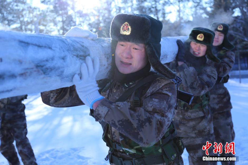 Soldiers garrisoning a fort in northeast China&apos;s Heilongjiang Province defy extreme coldness and conduct trainings at an undisclosed military camp on Saturday, Dec. 20. [Photo / CNS]