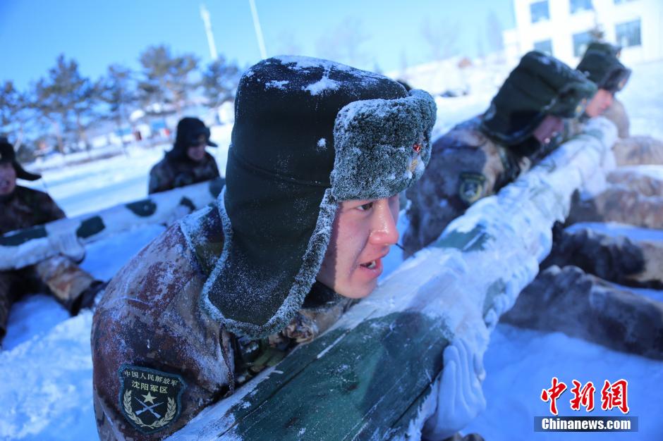 Soldiers garrisoning a fort in northeast China&apos;s Heilongjiang Province defy extreme coldness and conduct trainings at an undisclosed military camp on Saturday, Dec. 20. [Photo / CNS]