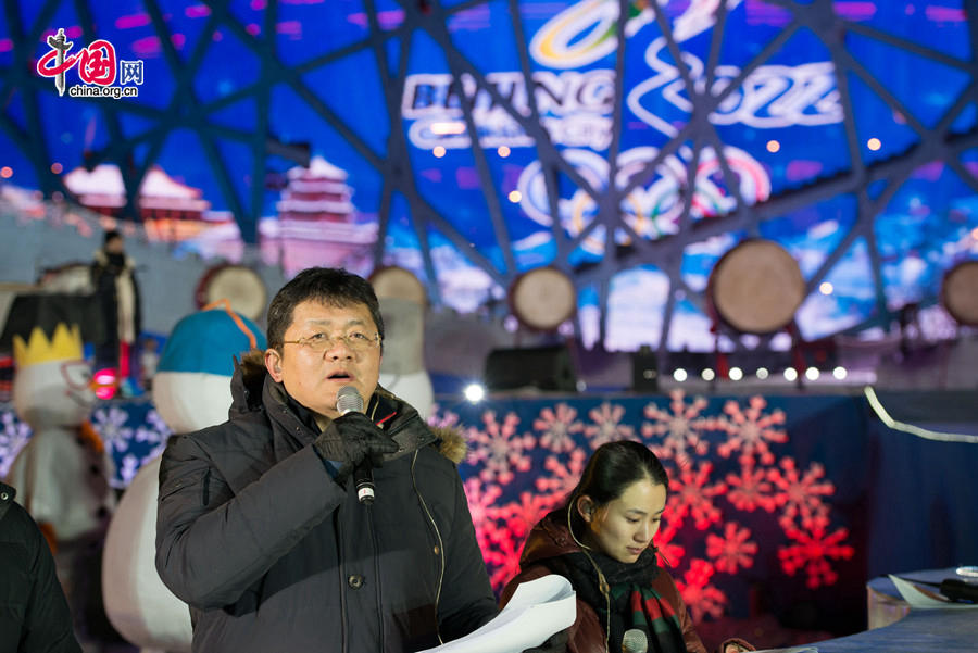 The New Year celebration 'Countdown to 2015' holds its last rehearsal at Beijing's Olympic Park, where the national symbols of the Bird's Nest stadium and the Water Cube National Aquatics Center are located, on Tuesday, Dec. 30, 2014. The ceremony also features the Chinese capital's bidding for the 2022 Winter Olympics. China Central Televsion's renowned sports presenter is to host the ceremony. [Photo by Chen Boyuan / China.org.cn]