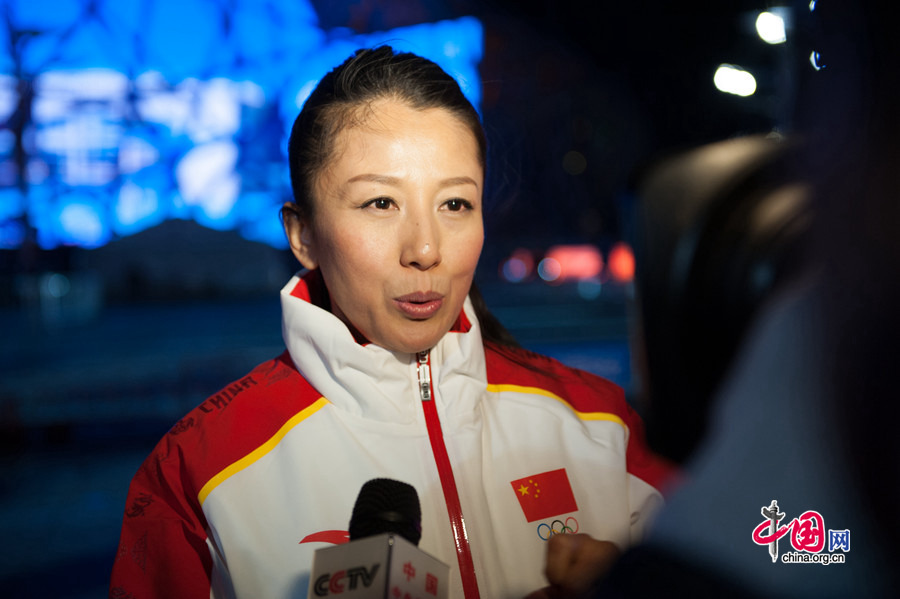 Yang Yang, Chinese gold metalist of Winter Olympics speaks about what benefits a successful Winter Olympics bidding China will have on the night of Dec. 31, 2014 at the Olympic Park, the place that hosts the National Stadium &apos;the Bird&apos;s Nest&apos; and the National Aquatics Center &apos;the Water Cube.&apos; [Photo by Chen Boyuan / China.org.cn]