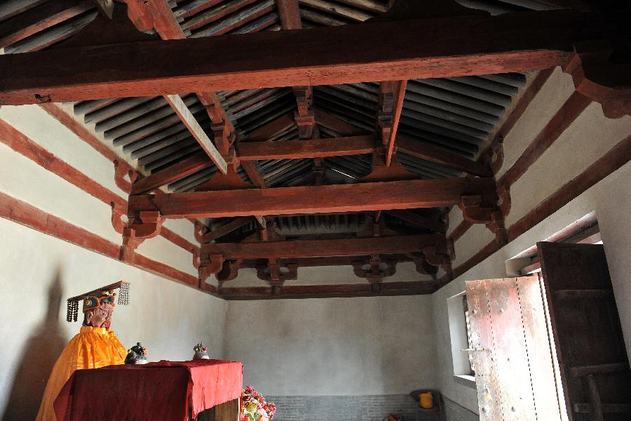 The interior of the Guangrenwang Temple is seen in this photo taken on August 5, 2014. [File Photo: Xinhua] 