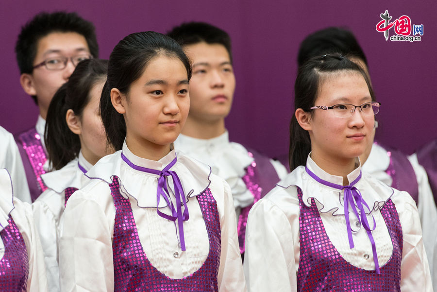 Choir of Tianjin Nankai High School perform singing at the launch of the English-edition &apos;Early Writings of Zhou Enlai&apos; on Thursday, Jan. 8, 2015 at the Great Hall of the People in Beijing. [Photo by Chen Boyuan / China.org.cn]