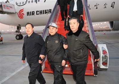 Wang Guoqiang felt a sense of relief as he stood on Chinese soil after living a fugitive's life in the United States for two years. 