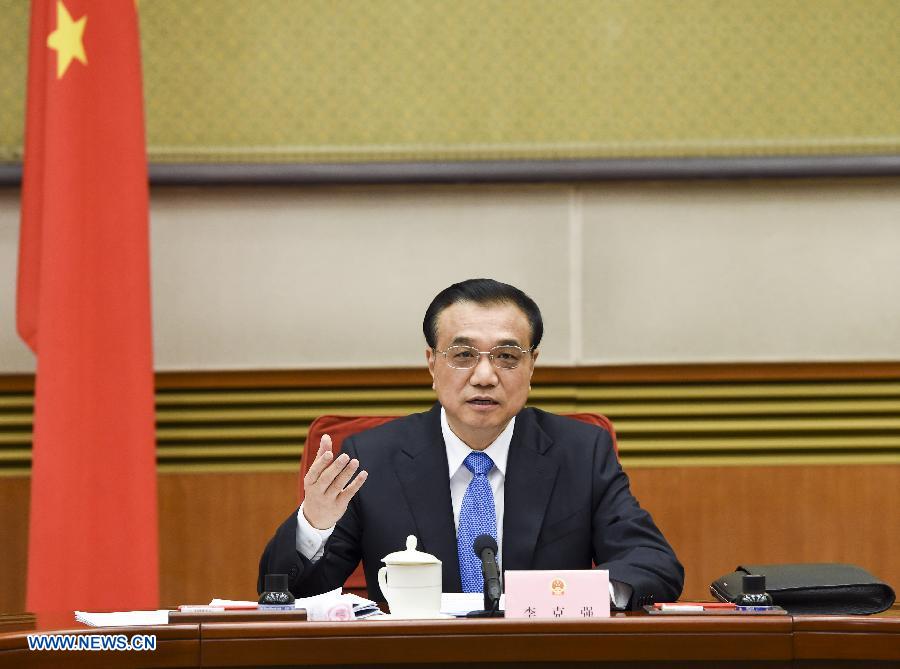 Chinese Premier Li Keqiang hosts the fourth plenary meeting of the State Council in Beijing, capital of China, Jan. 19, 2015. (Xinhua/Li Xueren)