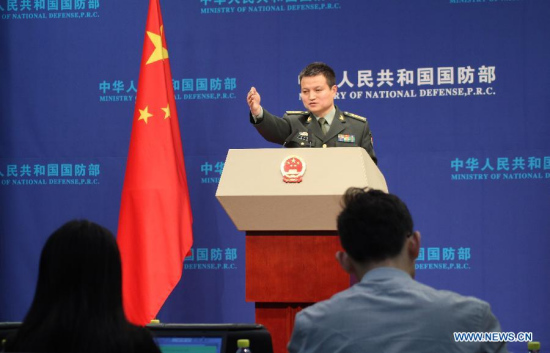 Yang Yujun, spokesman of the Ministry of National Defense (MND) of the People's Republic of China, answers questions on this year's military exercises plan, anti-corruption campaign, China-Japan talks on maritime crisis management mechanism and other issues at a regular press conference in Beijing, capital of China, Jan. 29, 2015. This is the first regular press conference in 2015 of the MND.[Photo/Xinhua]