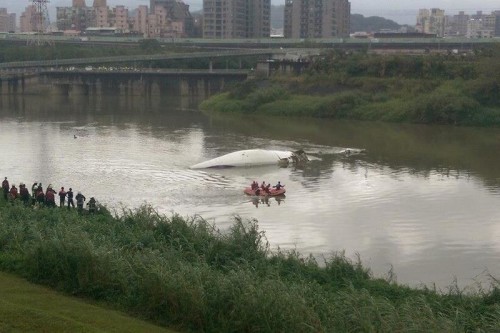 A TransAsia Airways plane with 53 passengers aboard clipped a bridge shortly after takeoff and crashed into a river in Taipei.