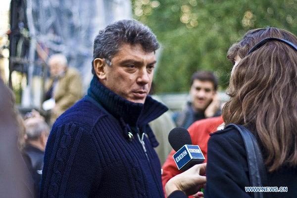 The archive photo taken on Oct. 7, 2009 shows Russian opposition leader Boris Nemtsov (L) attending a rally in memory of killed Russian journalist Anna Politkovskaya in Moscow, Russia. Russian opposition leader Boris Nemtsov was shot and killed near the city center on Feb. 28 (local time), 2015, Tass News Agency quoted government officials as saying. 