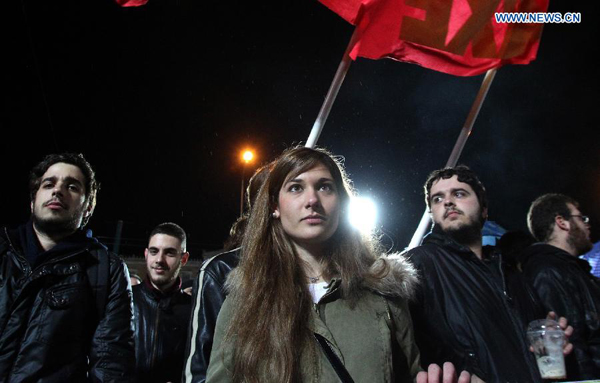 Greek Communist Party members take part in a rally to protest against the recent agreement reached between Greece and the Eurogroup, at Syntagma Square, Athens, Greece, on Feb. 27, 2015. This is the first anti-government protest since ruling coalition party Syriza took power. The Communist Party accuses the government of extending the debt-hit country's bailout commitments. 