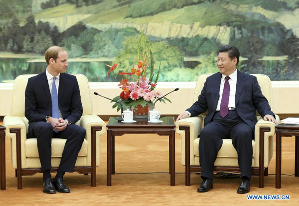 Chinese President Xi Jinping (R) meets with Britain's Prince William at the Great Hall of the People in Beijing, capital of China, March 2, 2015. [Photo/Xinhua]