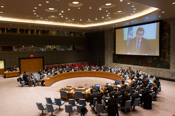 A wide view of the Security Council Chamber as Special Representative Bernardino Léon (shown on screen), briefs the Security Council via video conference on the situation in Libya.