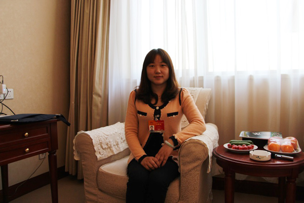 Zhu Xueqin, a grass-roots deputy who has not forgotten her roots. [Photo/Ma Chi]