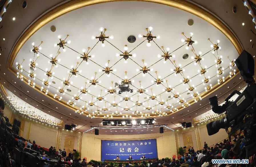 Zhang Mao, minister of the State Administration for Industry and Commerce (SAIC), gives a press conference during the third session of China's 12th China's National People's Congress (NPC) in Beijing, capital of China, March 9, 2015. (Xinhua/Li Ran)