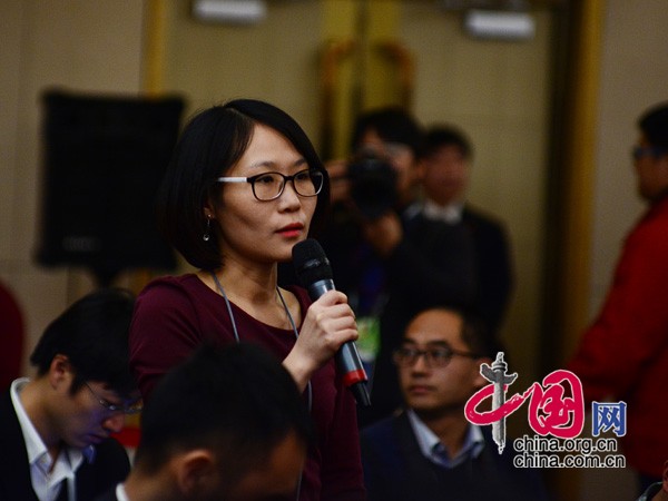 He Shan, a staff reporter from China.org.cn, raises her question at the press conference given by Wan Gang, minister of science and technology, for the third sessions of the 12th National People&apos;s Congress (NPC) in Beijing on Wednesday. [Photo/China.org.cn] 