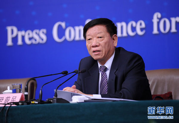 Yin Weimin, minister of human resources and social security says detailed guidelines are expected to come out at the end of this month at a press conference on March 10, 2015 in Beijing. [Photo: Xinhua]