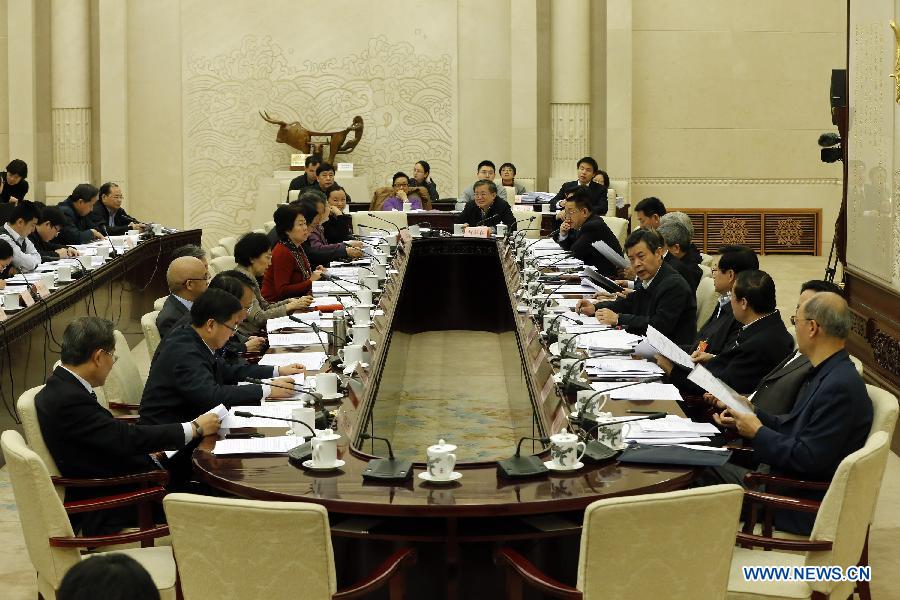 The Law Committee of the 12th National People's Congress (NPC) holds a meeting to deliberate on the draft revision to the Legislation Law in Beijing, capital of China, March 11, 2015. (Xinhua/Shen Bohan)