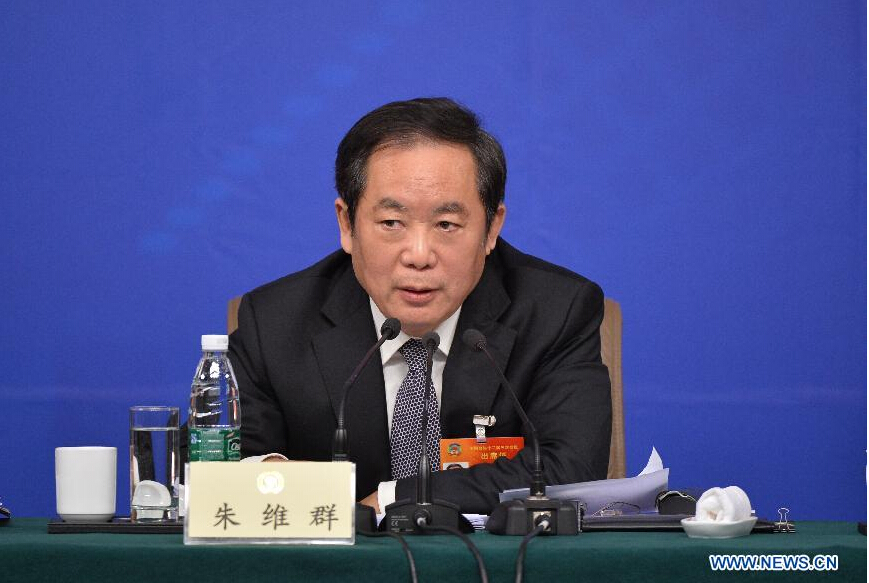 Zhu Weiqun, a member of the 12th National Committee of the Chinese People's Political Consultative Conference (CPPCC), gives a press conference during the third session of the 12th CPPCC National Committee in Beijing, capital of China, March 11, 2015. (Xinhua/Li Xin) 