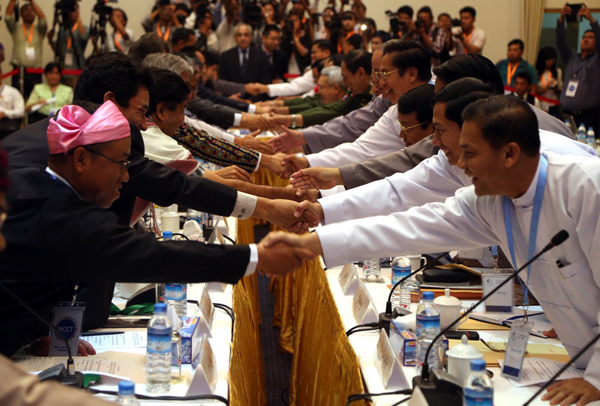 Peace negotiators of the Myanmar government and ethnic armed groups, in their first day of resumed peace talks in Yangon Tuesday, agreed to seek political ways for reducing conflict referring to the current fighting in Kokang region and Kachin state.