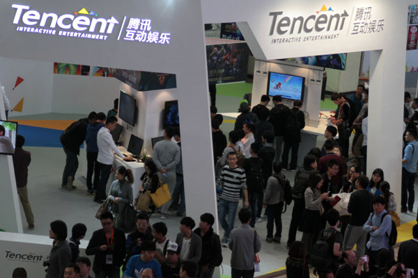 The booth of Tencent at an Internet culture expo in Beijing. The company will stop overseas commercial promotions through hard advertisements as WeChat's user growth has been plateauing in overseas markets.[Photo provided to China Daily]