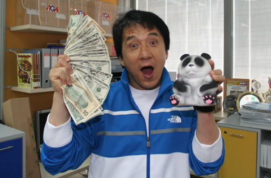 Jackie Chan poses with cash in this undated photo on Tumblr.