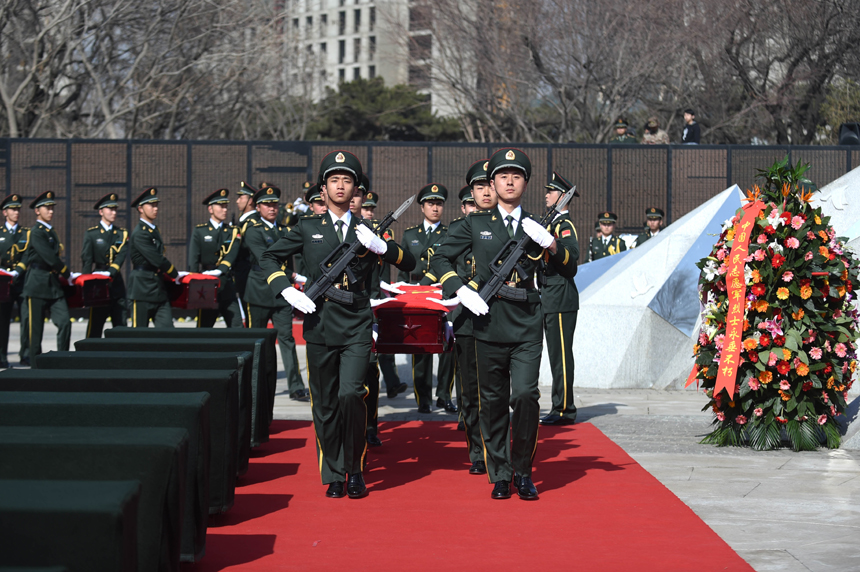 Remains of 68 Chinese soldiers killed in the 1950-53 Korean War were reburied in northeast China after they were excavated and returned from the Republic of Korea (ROK). A grand ceremony was held March 21, 2015 at Martyrs&apos; Park in Shenyang, capital city of Liaoning Province. It was attended by veterans, relatives of the soldiers and representatives from all walks of life. [Photo/Xinhua] 