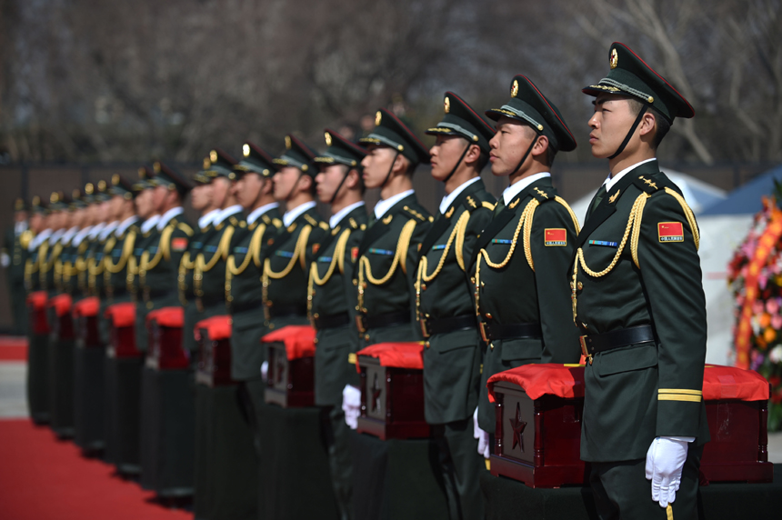 Remains of 68 Chinese soldiers killed in the 1950-53 Korean War were reburied in northeast China after they were excavated and returned from the Republic of Korea (ROK). A grand ceremony was held March 21, 2015 at Martyrs&apos; Park in Shenyang, capital city of Liaoning Province. It was attended by veterans, relatives of the soldiers and representatives from all walks of life. [Photo/Xinhua] 