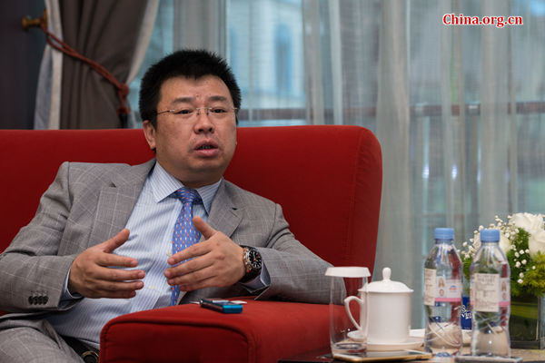Liu Ming, President and CEO of Hanergy Solar, a subsidiary of parent company Hanergy Holdings speaks about the company's vision for the future on March 21, 2015. [Photo by Chen Boyuan / China.org.cn]