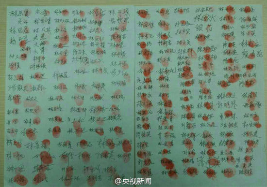 The signatures and finger prints of villagers from Yangchun Village, southeast China's Fujian Province, requesting the return of their lost Mummified Buddha statue. [Photo: CNTV]