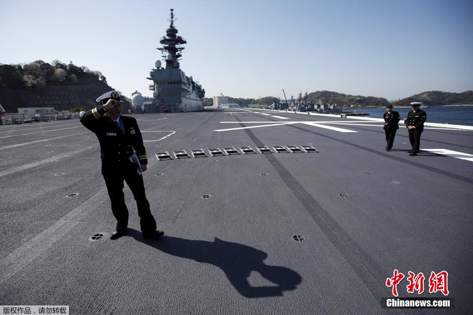 The Izumo helicopter carrier of Japan's Maritime Self-Defense Force (JMSDF) is seen in Yokosuka, Japan, March 31, 2015. [Photo/Chinanews.com] 