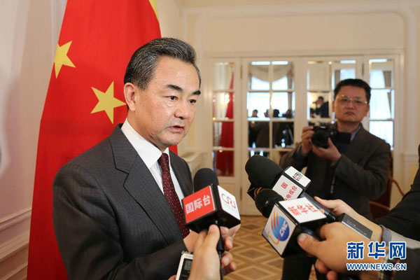Chinese Foreign Minister Wang Yi has hailed the Iran's nuclear talk in Swiss city of Lausanne as an 'important step' towards a comprehensive deal by June 30. [Photo/Xinhua]