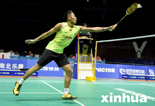 Lin Dan defended the men's singles title at the Badminton Asia Championships in Wuhan on Sunday, a boost for the Chinese superstar who is gearing up for the 2016 Rio Olympics. [Xinhua]