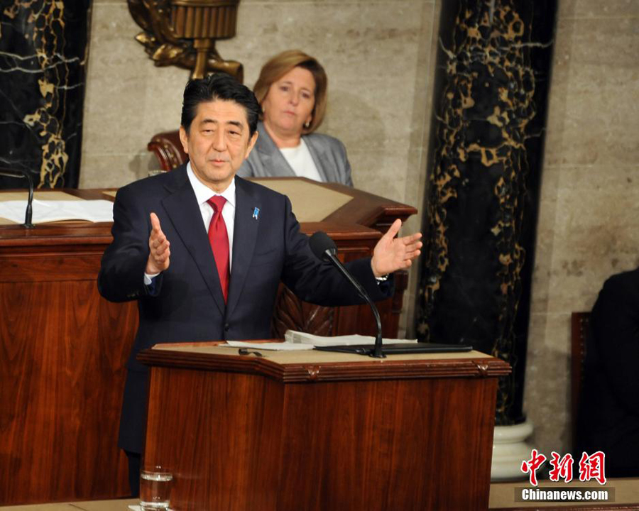 Japanese Prime Minister Shinzo Abe (C) addresses a joint meeting of Congress on Capitol Hill in Washington D.C., the United States, April 29, 2015. [Photo/Chinanews.com]