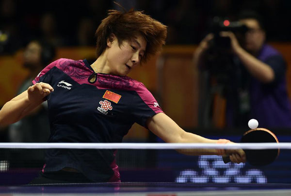 China's world number one Ding Ning competes against Poland's Natalia Partyka during the Women's Singles match at the Qoros 2015 World Table Tennis Championships in Suzhou, city of east China's Jiangsu Province, on April 29, 2015. Ding Ning won the match 4-0. [Xinhua]