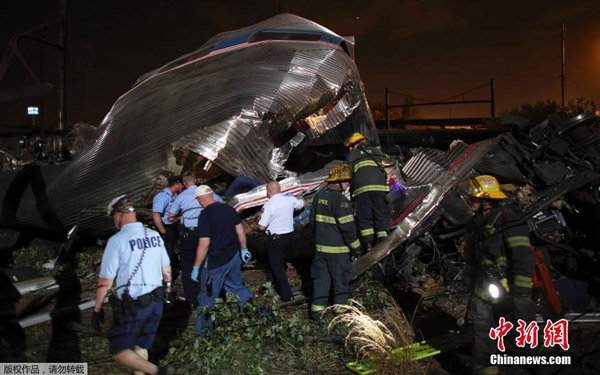 At least 5 people were killed in a passenger train derailment in Philadelphia, U.S., city mayor Michael Nutter said Tuesday. [Photo/Chinanews.com]