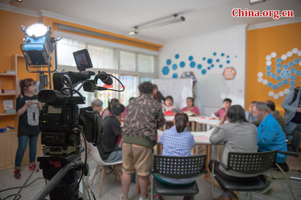 The short film 'Action Speaks Louder than Words' is the first-ever motion picture to be entirely funded by a residential community in Beijing. [Photo by Chen Boyuan / China.org.cn]