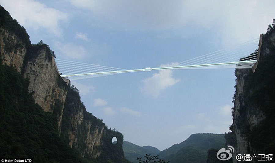 Following the world's longest cantilever bridge in Chongqing, another record-breaking glass bridge will open in Zhangjiajie, Hunan Province in July. The structure, which is 430 meters long, six meters wide and 300 meters above the valley floor, can carry 800 people. [Weibo.com]