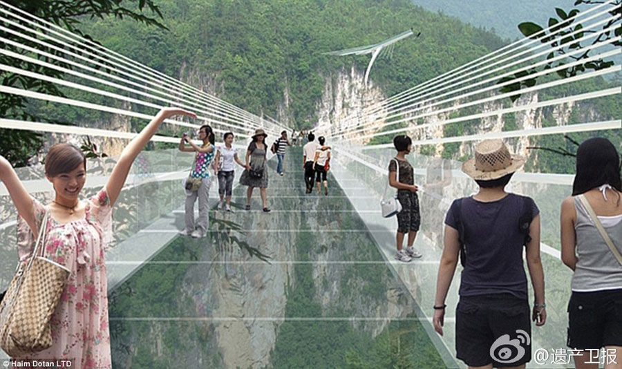 Following the world's longest cantilever bridge in Chongqing, another record-breaking glass bridge will open in Zhangjiajie, Hunan Province in July. The structure, which is 430 meters long, six meters wide and 300 meters above the valley floor, can carry 800 people. [Weibo.com]