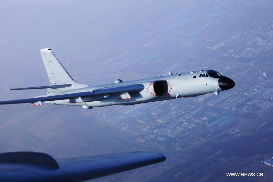 File photo shows a bombardment aircraft of the People's Liberation Army (PLA) Air Force participating in a training. Aircraft of the People's Liberation Army (PLA) Air Force flew over the Miyako Strait for the first time on May 21, 2015 for training in western Pacific, a military spokesperson said. [Photo: Xinhua/Tian Ning]