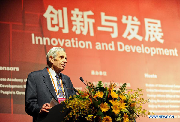 The file photo taken on Sept. 28, 2011 shows the Nobel Prize laureate John Nash delivering a speech during Nobel Laureates Beijing Forum 2011 in Beijing, capital of China. Renowned Princeton Mathematician John Nash, a Nobel Prize laureate whose life story inspired the movie 'A Beautiful Mind', was killed in a car accident together with his wife in New Jersey, U.S. media reported Sunday. [Photo/Xinhua]