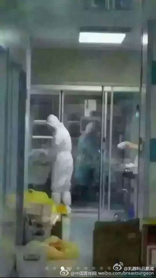 Photo shows medical workers fighting against MERS in the intensive care unit at the Huizhou City Central People's Hospital in south China's Guangdong province. [Photo: weibo.com]