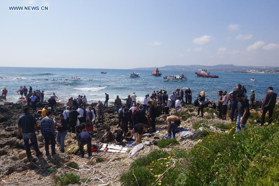 Rescue operations are carried out on Rhodes island, Greece, April 20, 2015. A vessel carrying approximately 200 irregular migrants sank off the coasts of Rhodes island in southeastern Aegean Sea on April 20, 2015, local authorities said. At least three people died in the accident. [Photo/Xinhua]