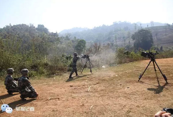 This photo released by the official WeChat account of PLA Daily shows infantry fighting vehicles being deployed to take part in a live-ammunition drill which will start Tuesday in a border area of Yunnan province near Myanmar.