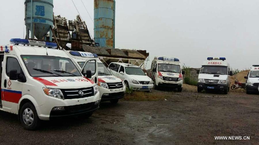 Ambulances are ready for rescue work near the site of the overturned passenger ship in the Jianli section of the Yangtze River in central China's Hubei Province June 2, 2015.