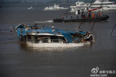 The ship has been turned 180 degrees and rests on its bottom now. [Xinhua/Sun Chengyu]
