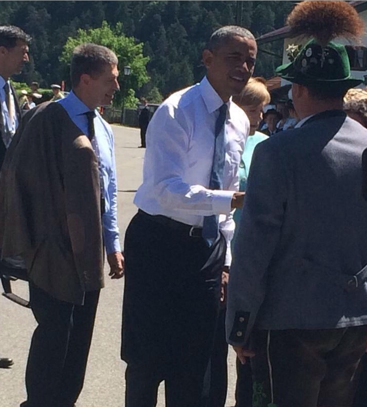 President of the United States Barack Obama is welcomed by local residents.