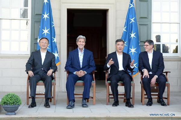 Chinese Vice Premier Wang Yang (2nd R), Chinese State Councilor Yang Jiechi (1st L), U.S. Secretary of State John Kerry (2nd L) and U.S. Treasury Secretary Jacob Lew pose for photos at Mount Vernon, the home of first U.S. President George Washington, in Virginia, the United States, on June 22, 2015.