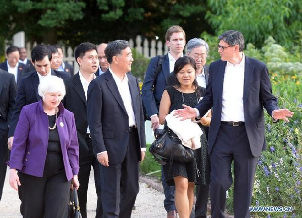 Chinese Vice Premier Wang Yang (2nd L, front), U.S. Treasury Secretary Jacob Lew (1st R, front) and Federal Reserve Chair Janet Yellen (1st L, front) walk at Mount Vernon, the home of first U.S. President George Washington, in Virginia, the United States, on June 22, 2015.
