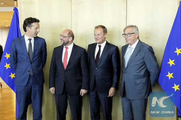 Eurogroup Chairman Jeroen Dijsselbloem, European Parliament President Martin Schulz, European Council President Donald Tusk and European Commission President Jean-Claude Junker (L-R) pose for a group photo at the end of a meeting in Brussels, Belgium, June 16, 2015. [Photo/Xinhua]