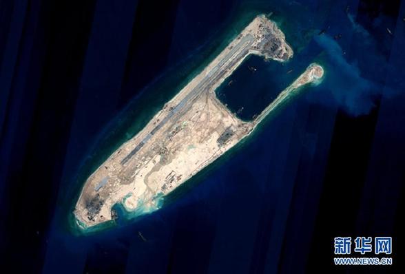 This satellite image released on June 16 shows the Fiery Cross Reef where the reclamation project has been completed. [Xinhua]