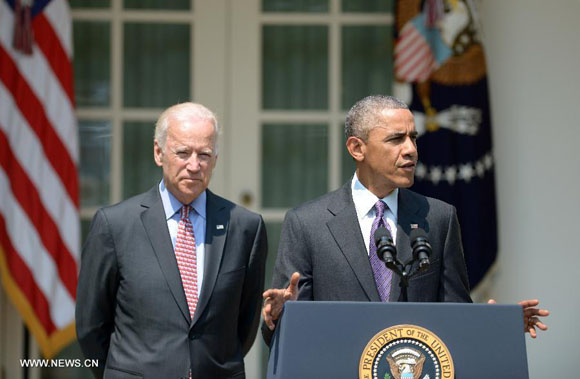 U.S. President Barack Obama and Vice President Joe Biden attend a press conference at the White House in Washington, the United States, July 1, 2015. The United States and Cuba have agreed to formally reestablish diplomatic relations and reopen embassies, U.S. President Barack Obama said Wednesday. [Photo/Xinhua]