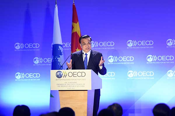 Chinese Premier Li Keqiang addresses the Organization for Economic Cooperation and Development in Paris on July 1, 2015. [Photo: gov.cn] 